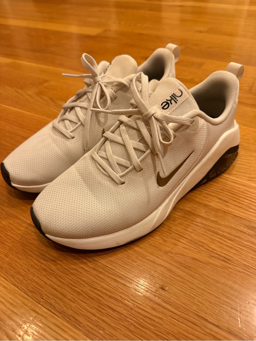 Nike women’s Athletic Sneakers - Cream with Gold Swoosh 8.5
